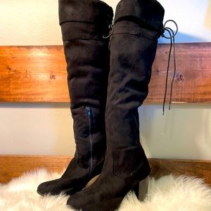 Thigh high black boots